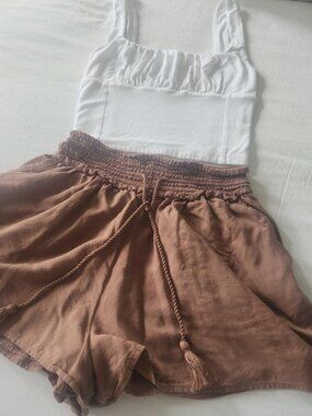 Summer outfit. Perfect condition and includes shorts and top